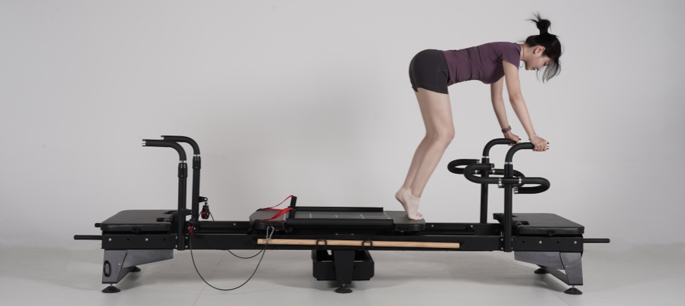 Pilates Reformer Machine mit rotierenden Griffen Pilates Reformer Machine mit rotierenden Griffen